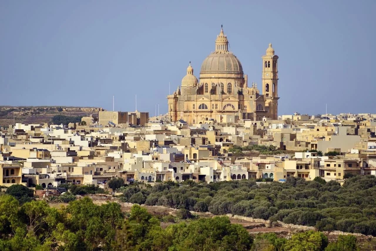 Arrive and cross to Gozo