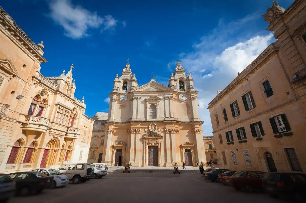 The baroque cathedral facing its square in Mdina