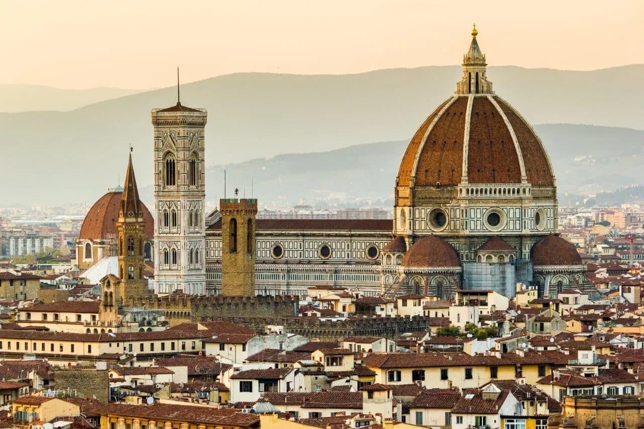 Florence Cathedral's dome and bell tower above the city's rooftops