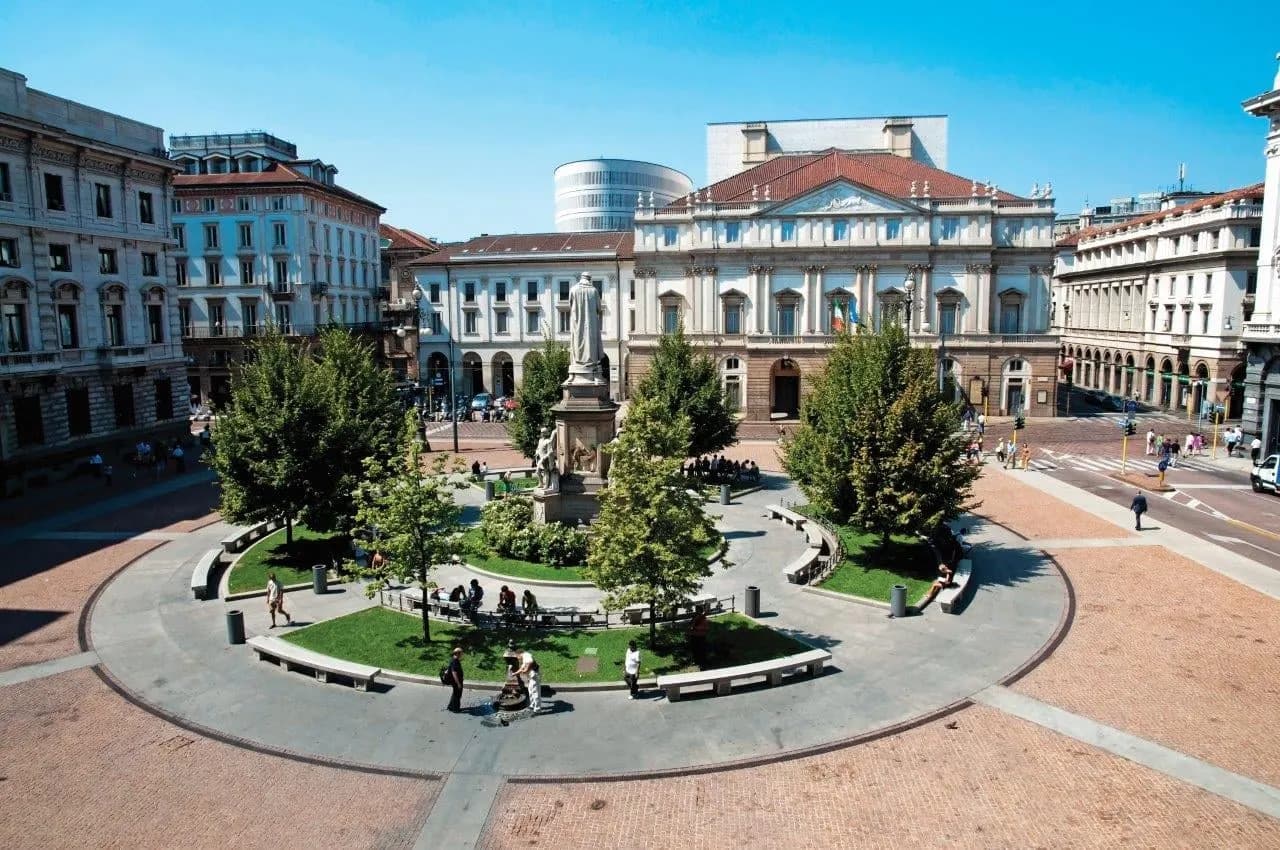 Piazza della Scala in Milan with its central garden and the La Scala opera house behind