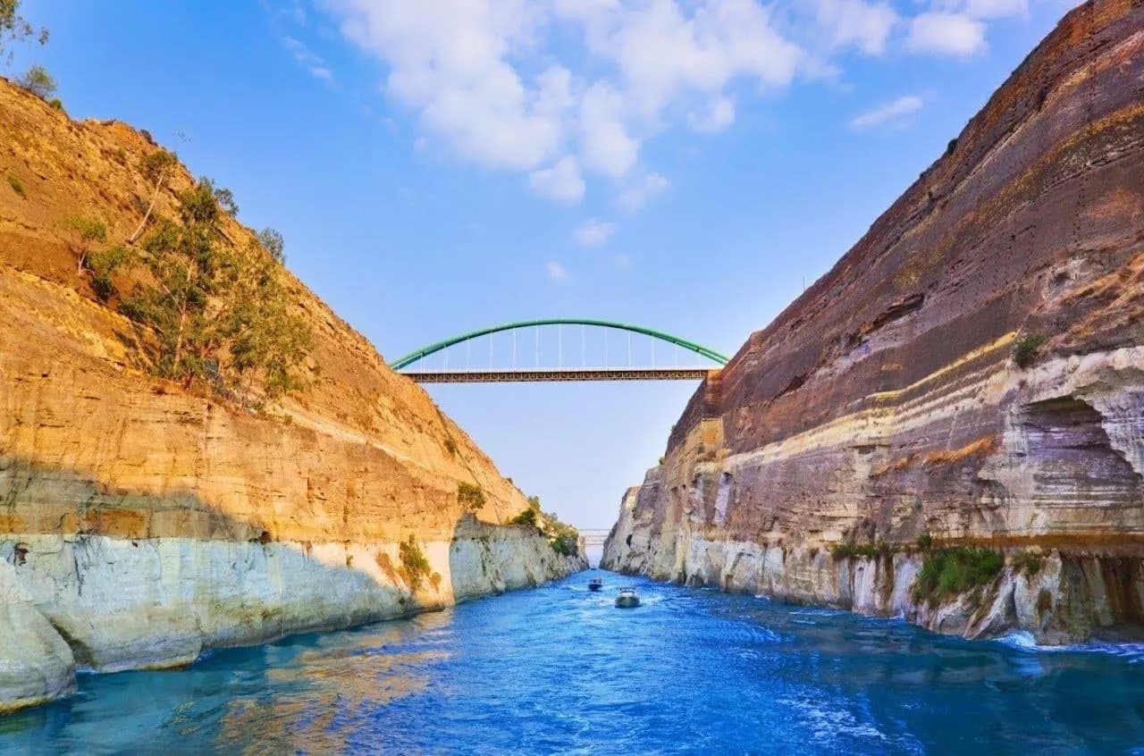 A bridge high above the steep rock walls of the Corinth Canal