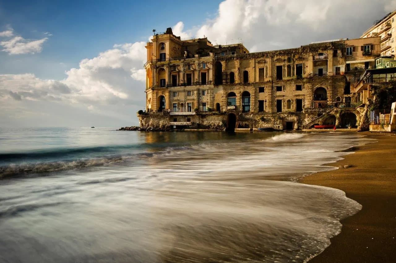 Palazzo Donn'Anna standing at the water's edge on the Posillipo shore