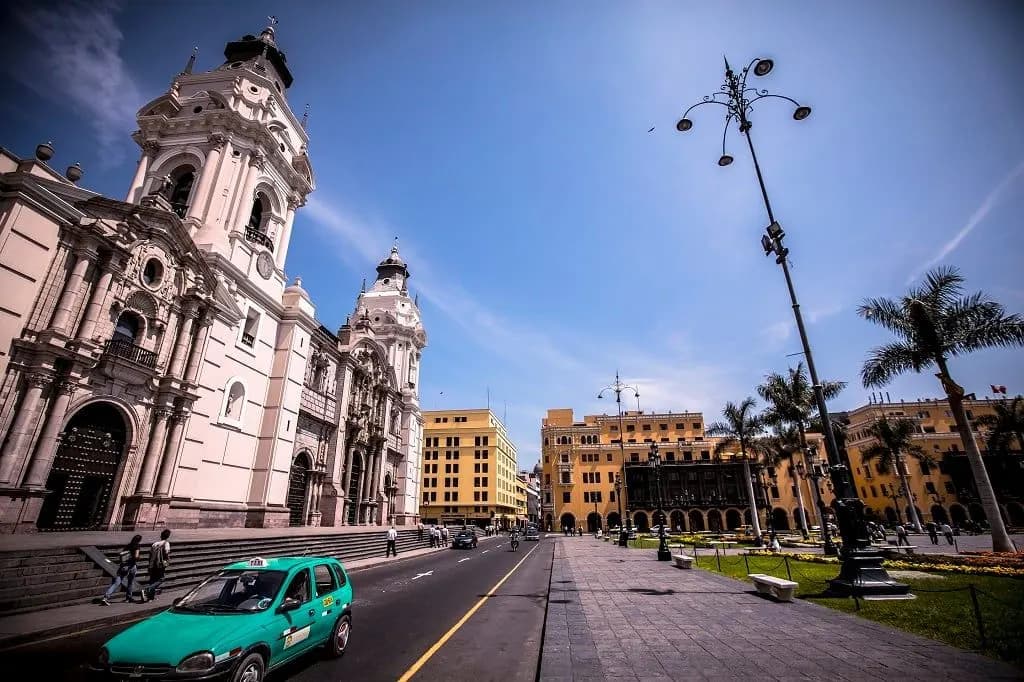 Lima Cathedral beside the main square under a blue sky