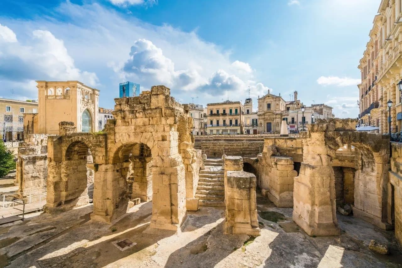 Stone arches of the Roman amphitheatre in the centre of Lecce