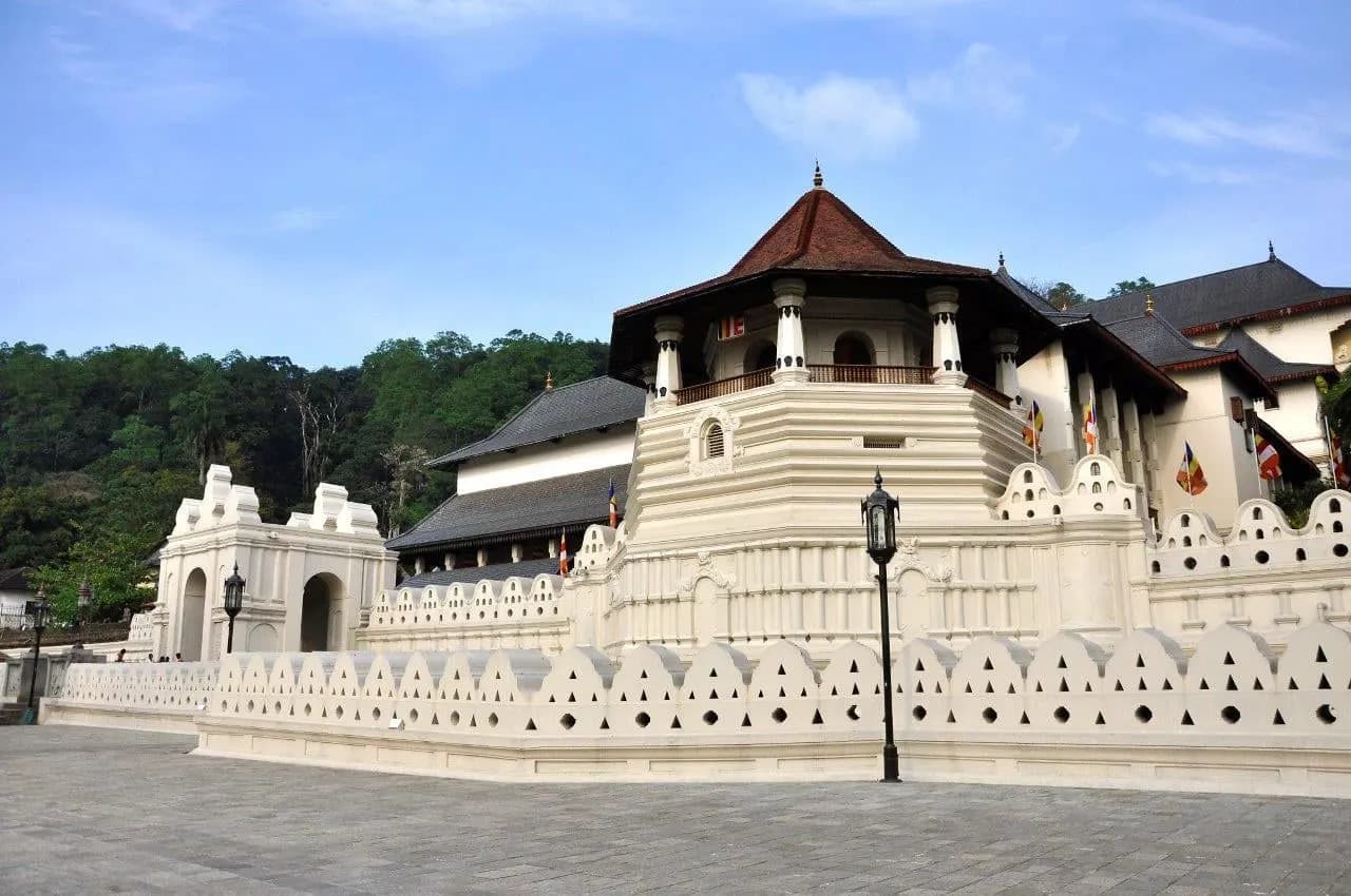 The white walls and octagonal pavilion of the Temple of the Tooth in Kandy