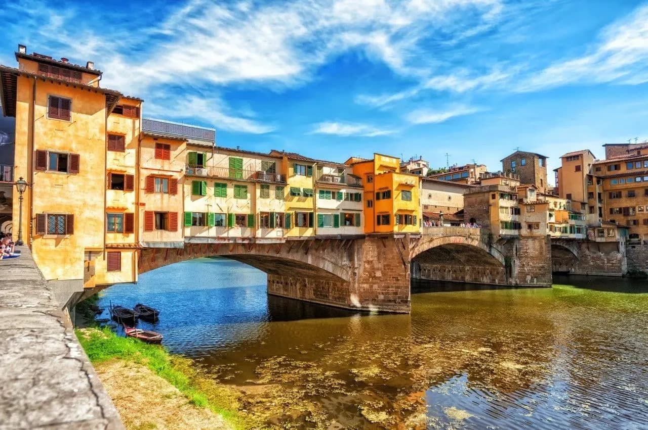 The Ponte Vecchio and its shopfronts over the Arno in Florence