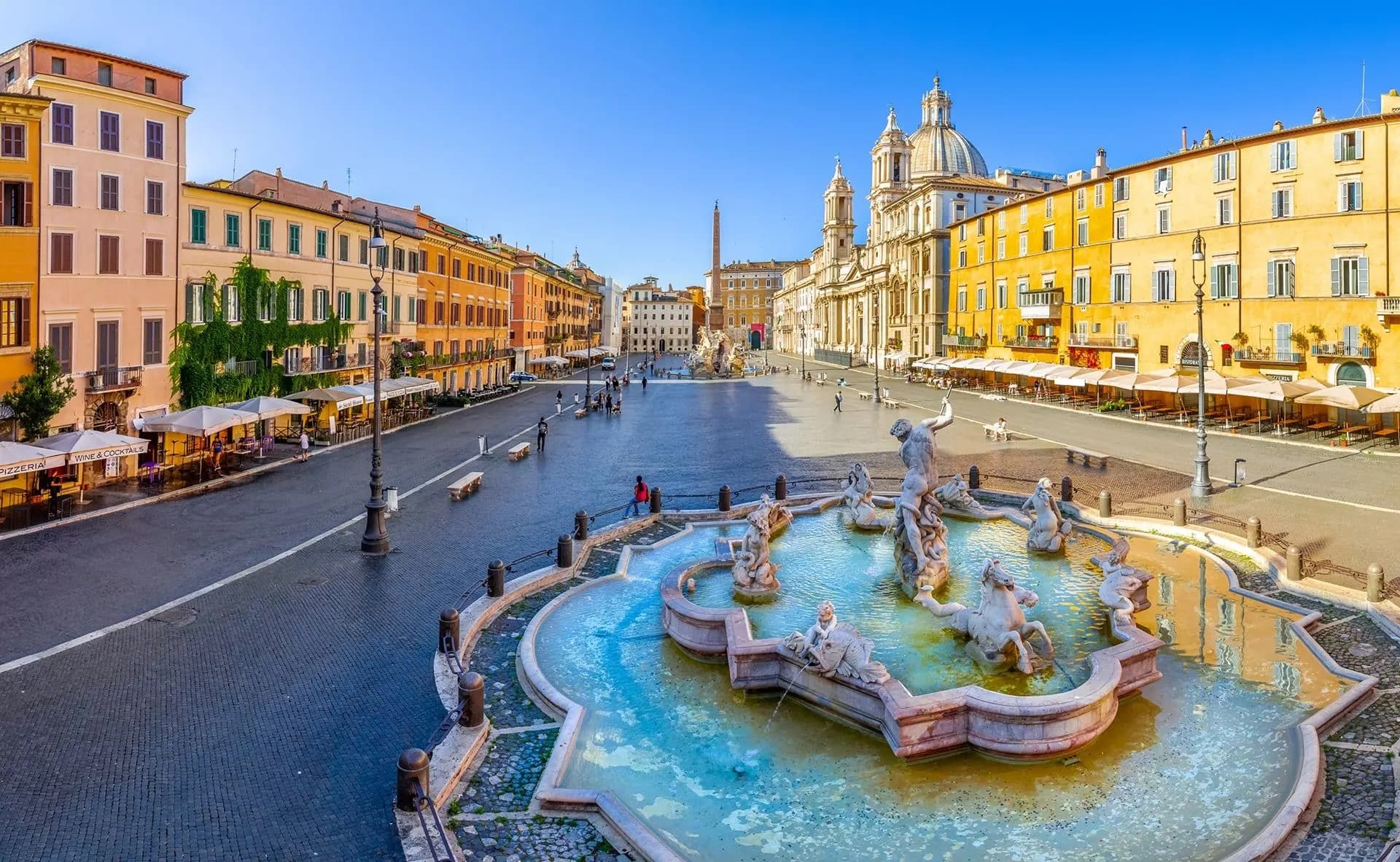 Fountains and ochre facades around Piazza Navona in Rome