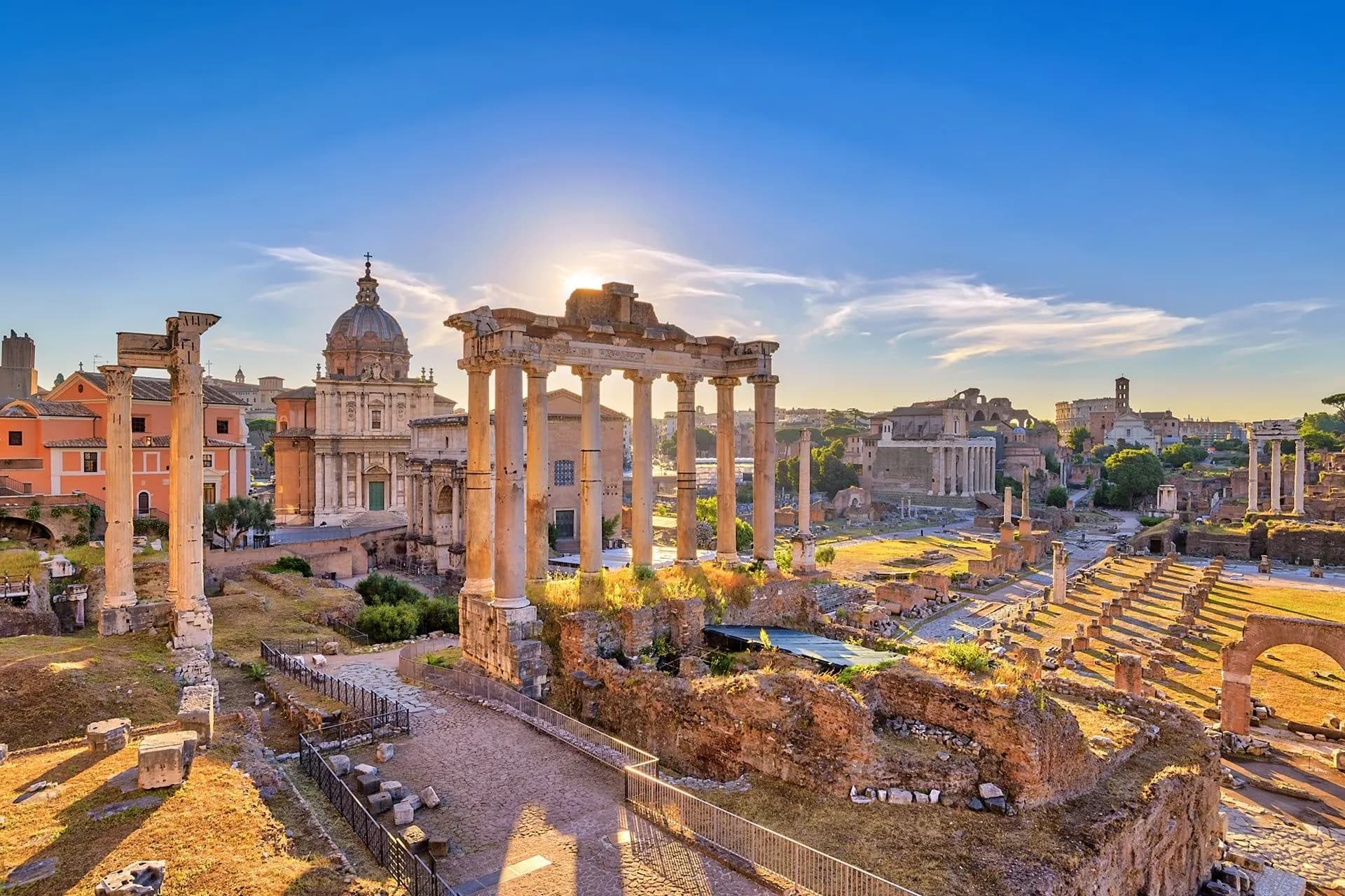 Columns and ruins of the Roman Forum in late afternoon light