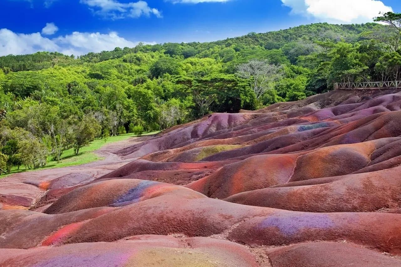 The ridged, many-coloured earth of Chamarel, ringed by forest