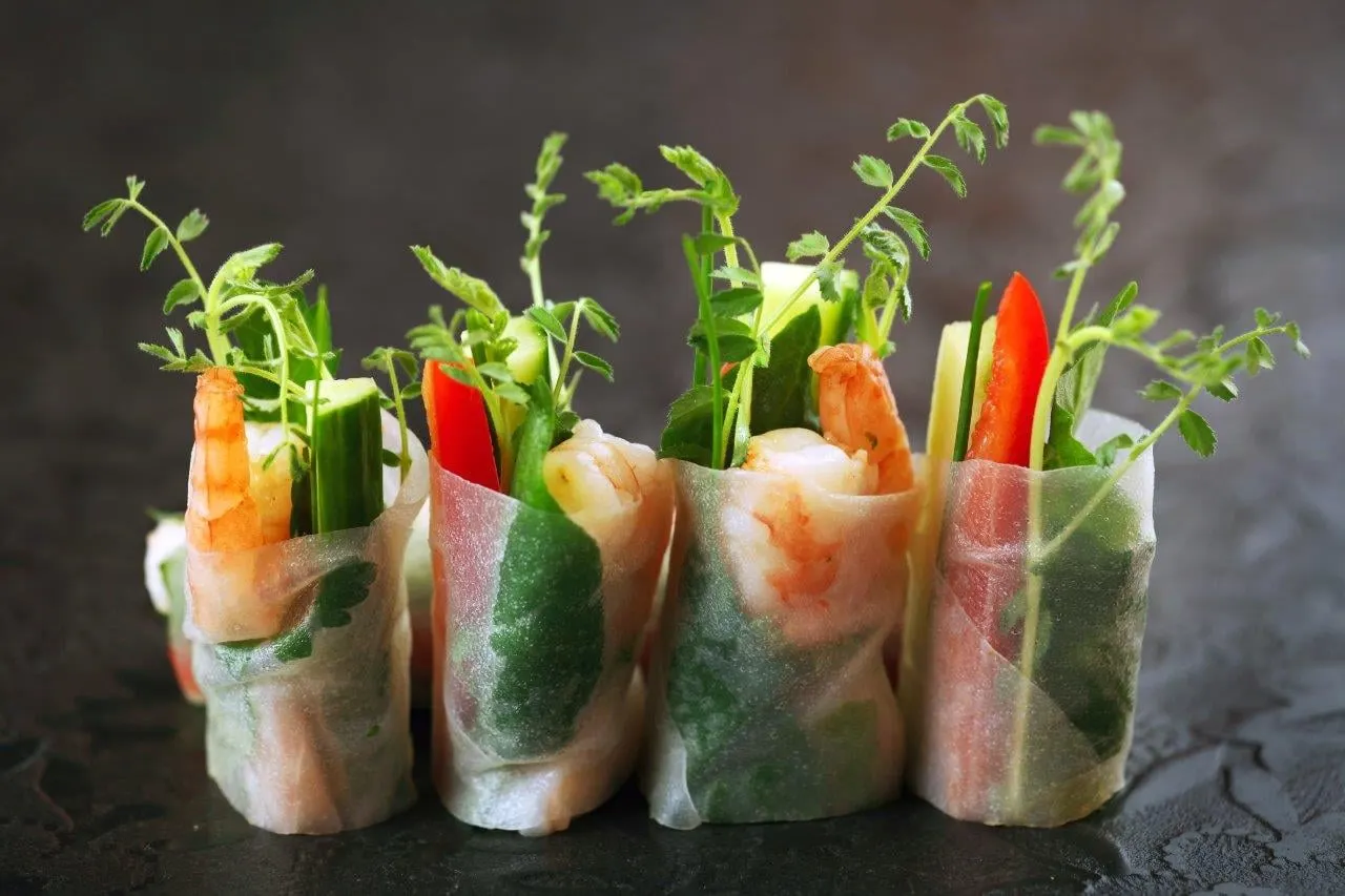 Fresh rice paper rolls filled with prawns, vegetables and herbs
