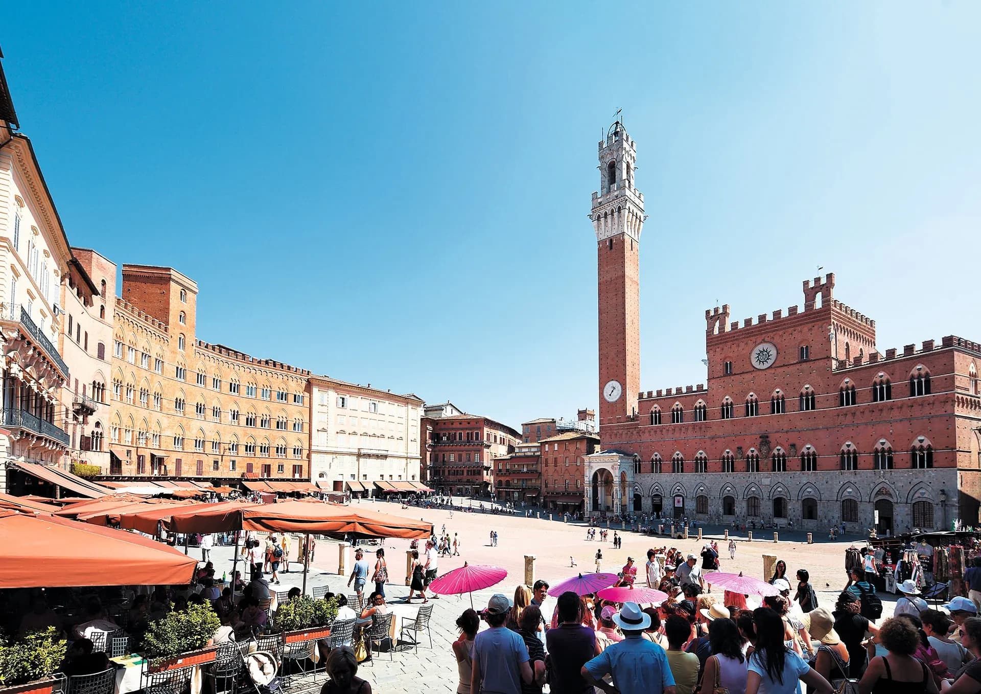 The Piazza del Campo in Siena with the Palazzo Pubblico and its tall tower