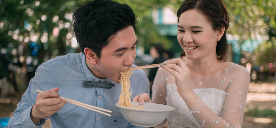 Bride and Groom obsessed with food, create wedding album with photos of them eating 