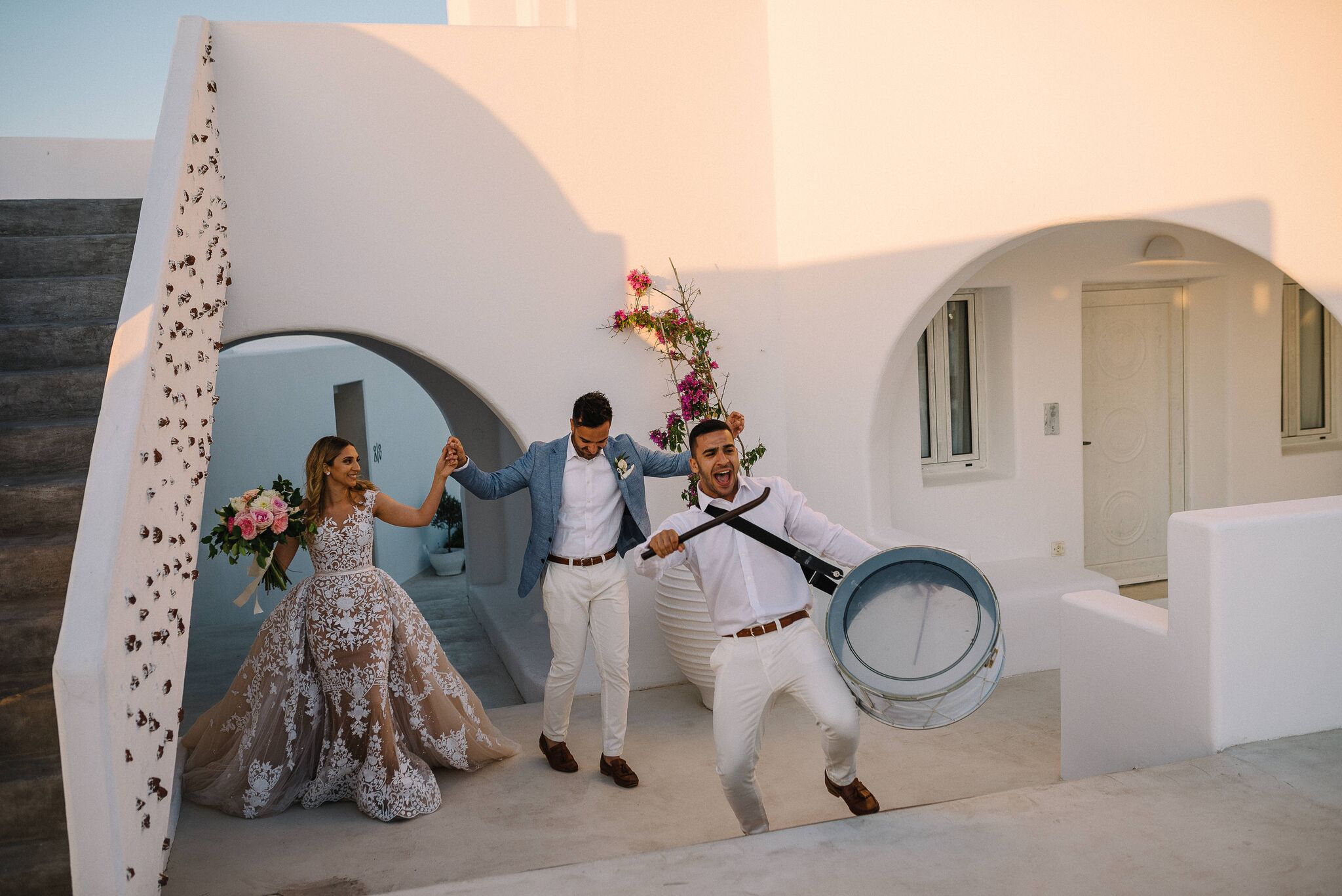 An All-White Wedding Set Against The Santorini Sunset - Wedded Wonderland