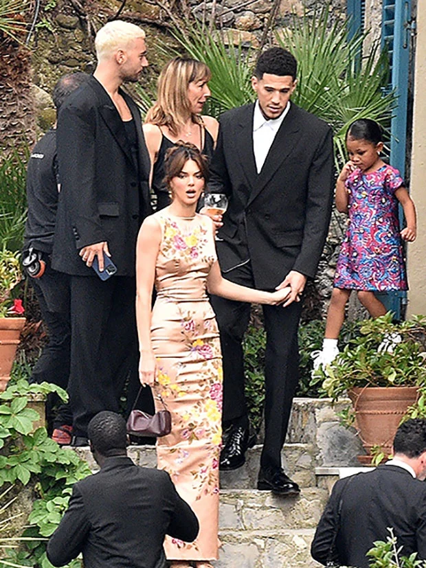 What The Kardashian/Jenner Family Wore to Kourtney Kardashian and Travis Barkers Wedding