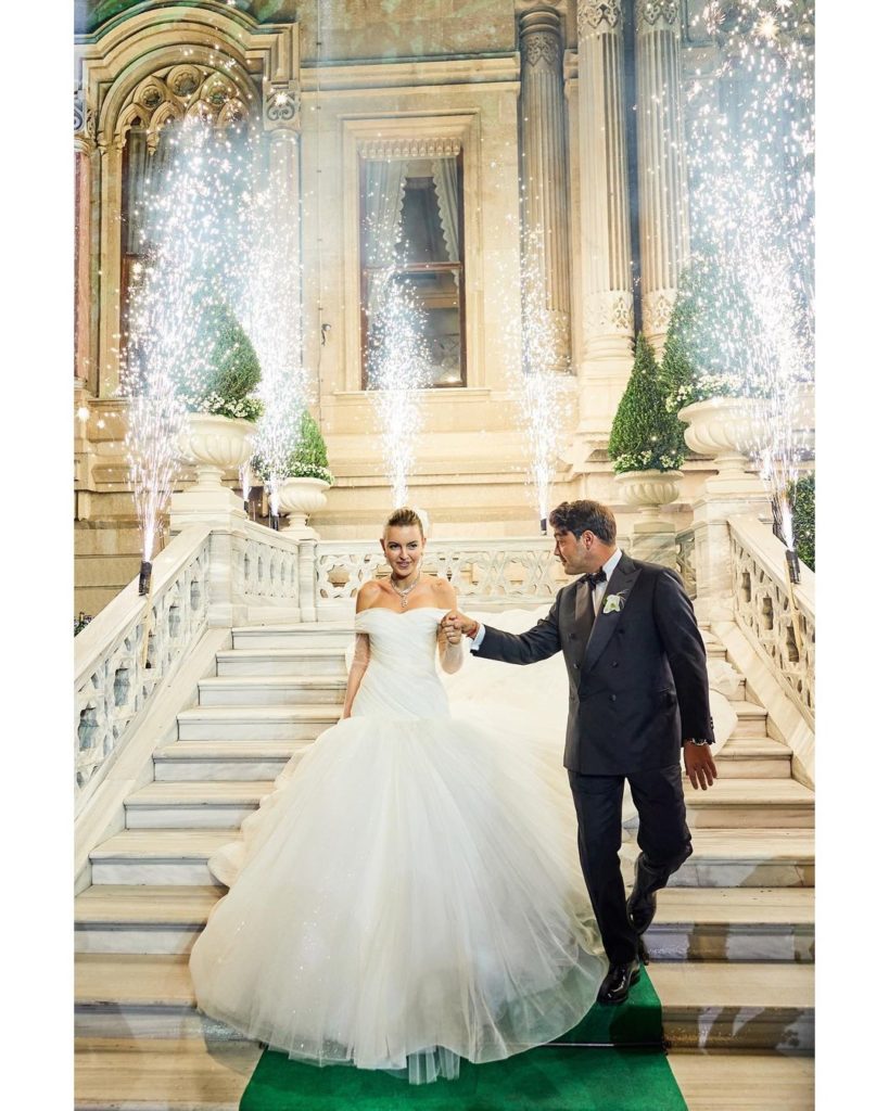 The beautiful couple walking down the steps of Ciragan Palace Kempinski Istanbul