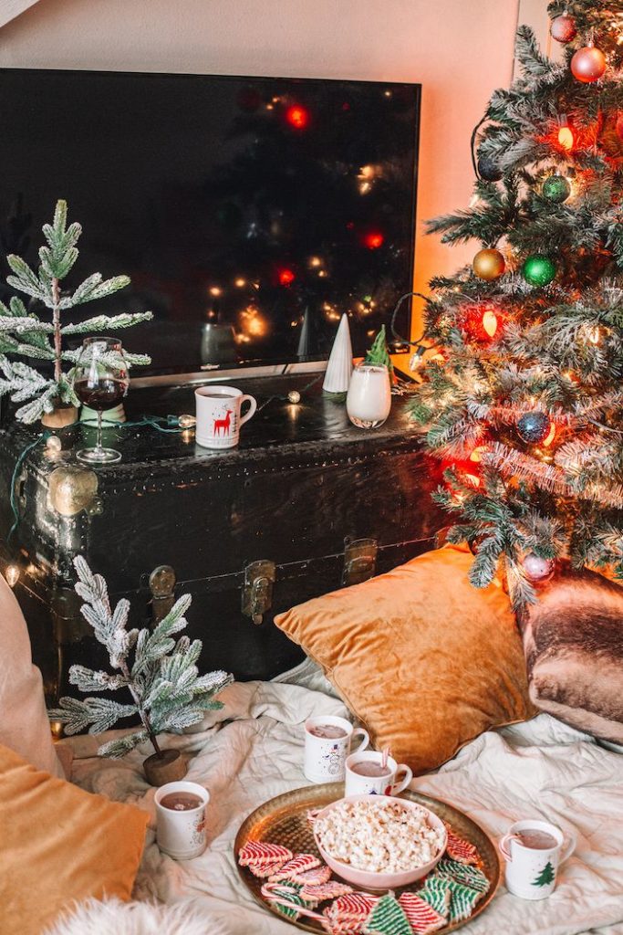 Watch holiday movies while sipping hot cocoa for your first Christmas newly weds
