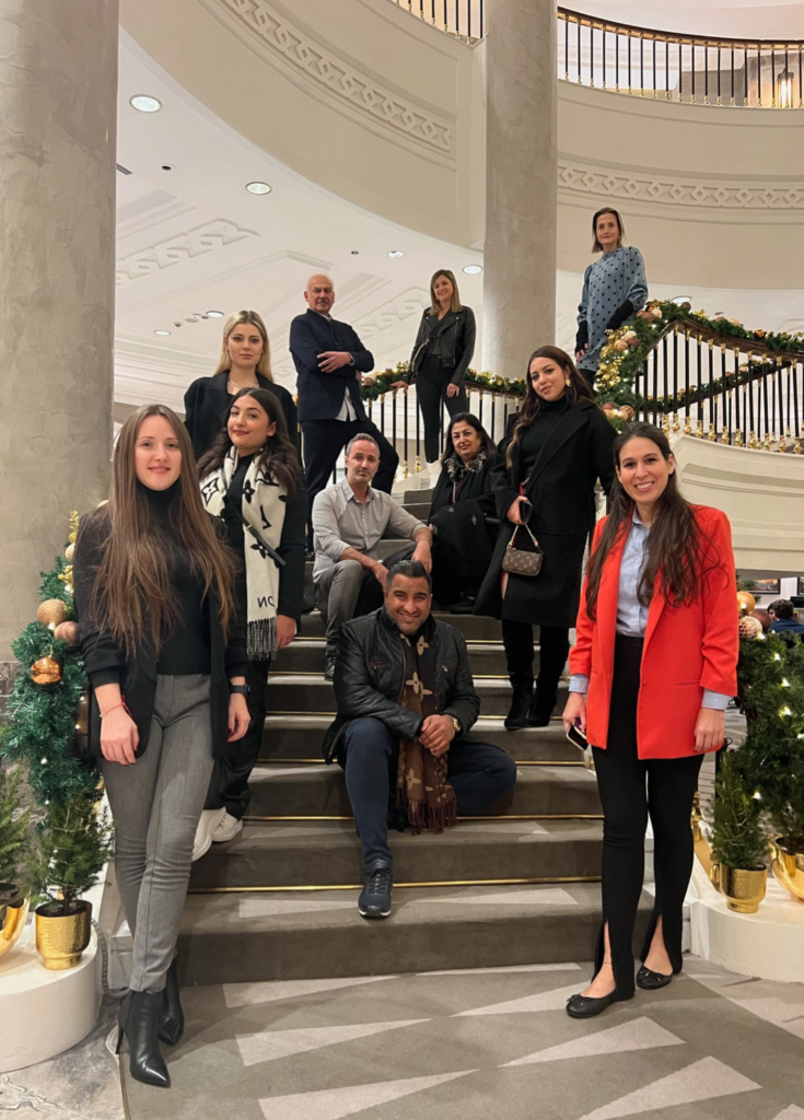 Turkey Tourism group pose for a photo in hotel lobby