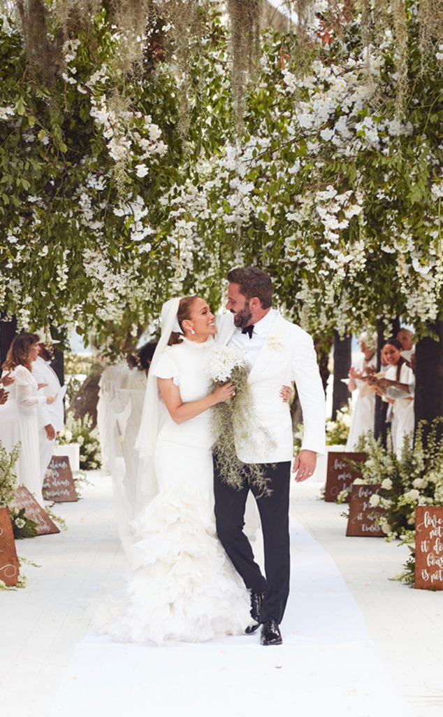 Celebrities JLo and Ben Affleck Surrounded by White Florals, Greenery, and Wedding Guests