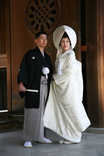 All white traditional Japanese wedding kimono with an elaborate headpiece
