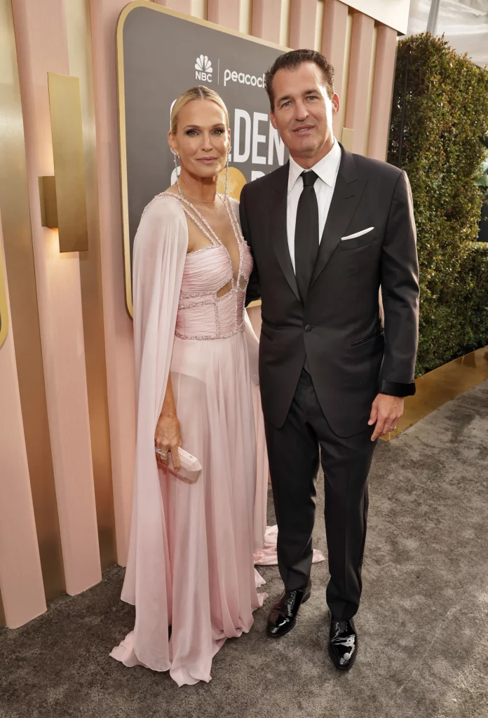 Molly Sims in a light pink caped gown at the 2023 Golden Globes she embraced a monochrome look.
