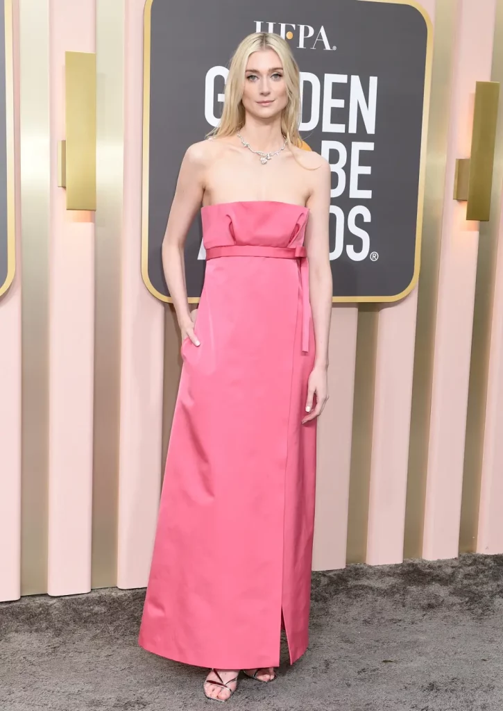 Actress Debicki's Golden Globe look featuring a pink Dior dress reminiscent of Princess Diana's style, complemented by a natural manicure 