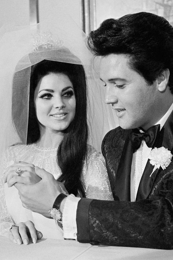 Beautiful portrait of Elvis and Priscilla Presley on their wedding day at  Aladdin Hotel in Las Vegas