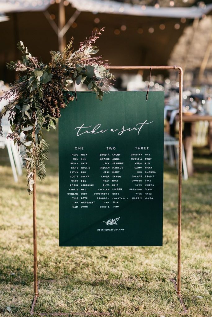 A beautiful and rustic themed seating chart to ensure the guests sit on their assigned place