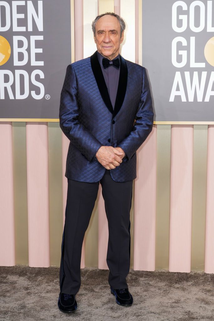 F. Murray Abraham with a navy blue velvet Giorgio Armani suit, a subtle yet striking twist on the traditional suit 