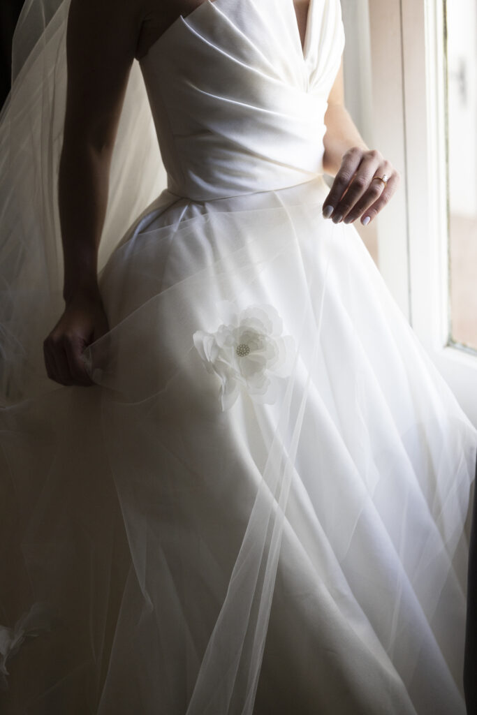 Close-up details of the bride's dress 