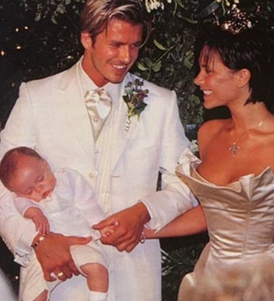 David and Victoria Beckham wedding photo with Brooklyn Beckham as a baby.