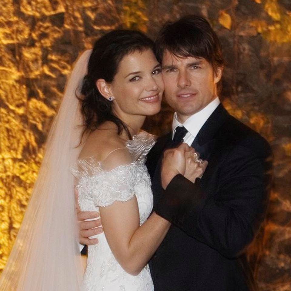 Tom Cruise and Katie Holmes wedding ensemble, the couple got engaged in Paris by the Eiffel Tower.