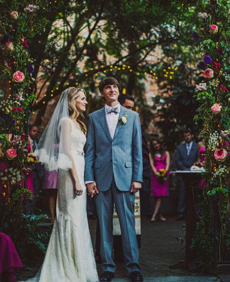 Magical garden themed wedding with nature, flowers, and trees surrounding you.