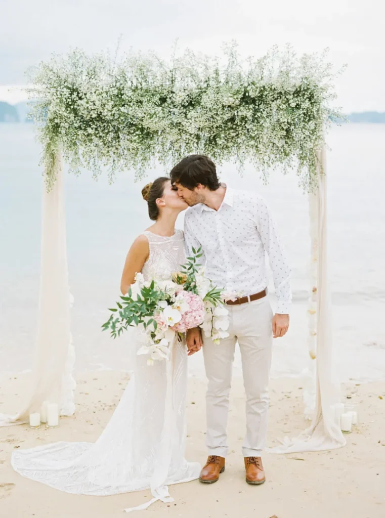 This Is How Much A Destination Wedding In Thailand Will Cost You 4 Couple getting married by the beachside of Thailand.