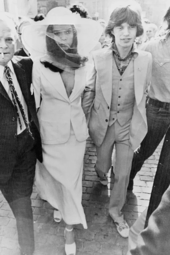 Bianca Jagger bridal suit with hat veil