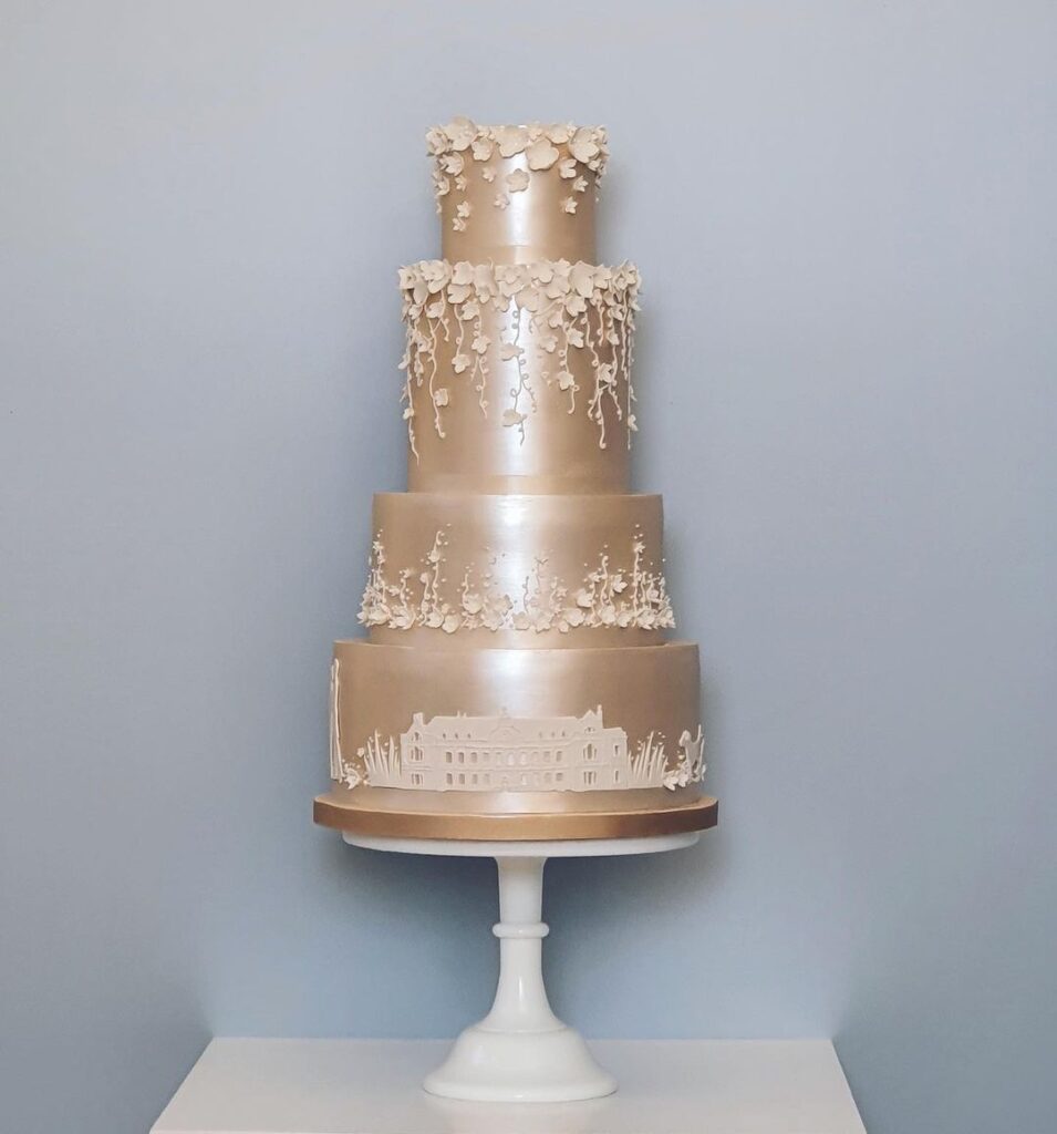 Metallic wedding cake that tells a story.
