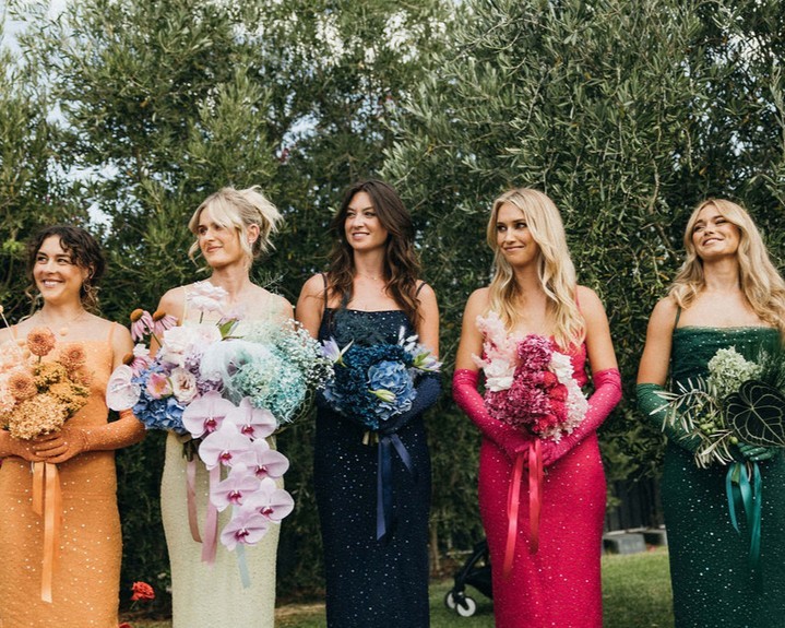 Bridal trend 2023, matching bridesmaid dresses to bouquets.
