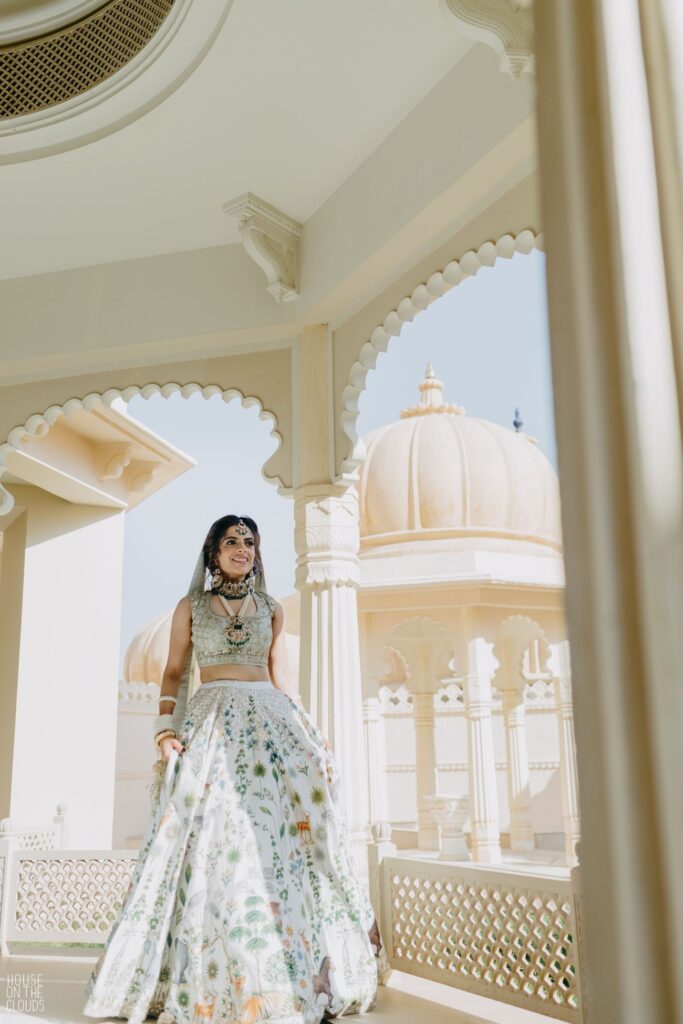 Beautiful bride with scenic and majestic background in Udaipur, India a one of the wedding destinations in India.