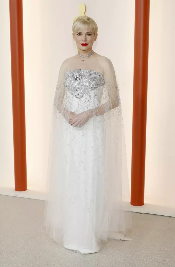 Michelle Williams in an all-white Chanel couture gown.