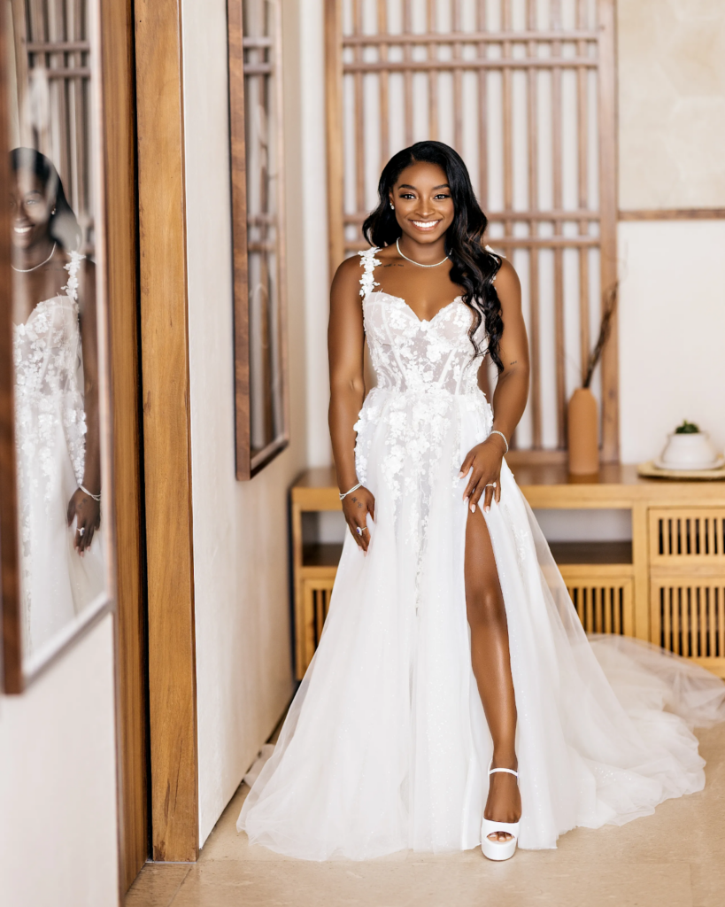 Simone Biles looking stunning in her wedding ceremony gown, a custom Gimaya.