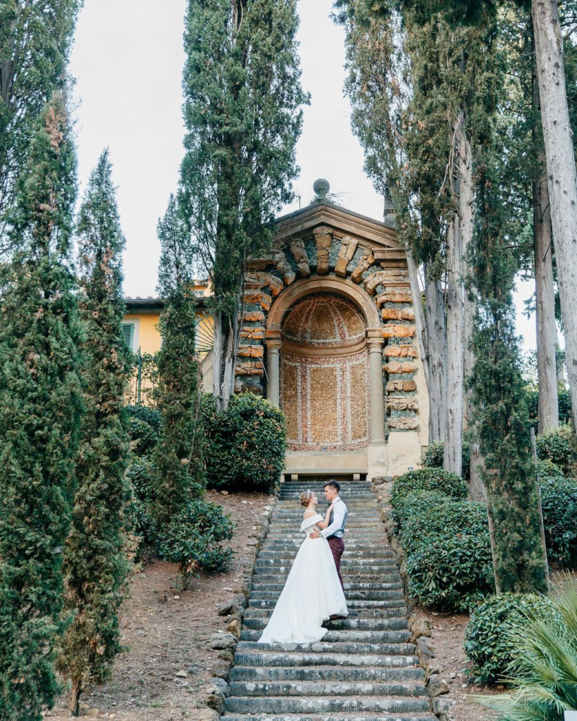 Destination wedding in Florence, Italy, the couple in a stunning garden.