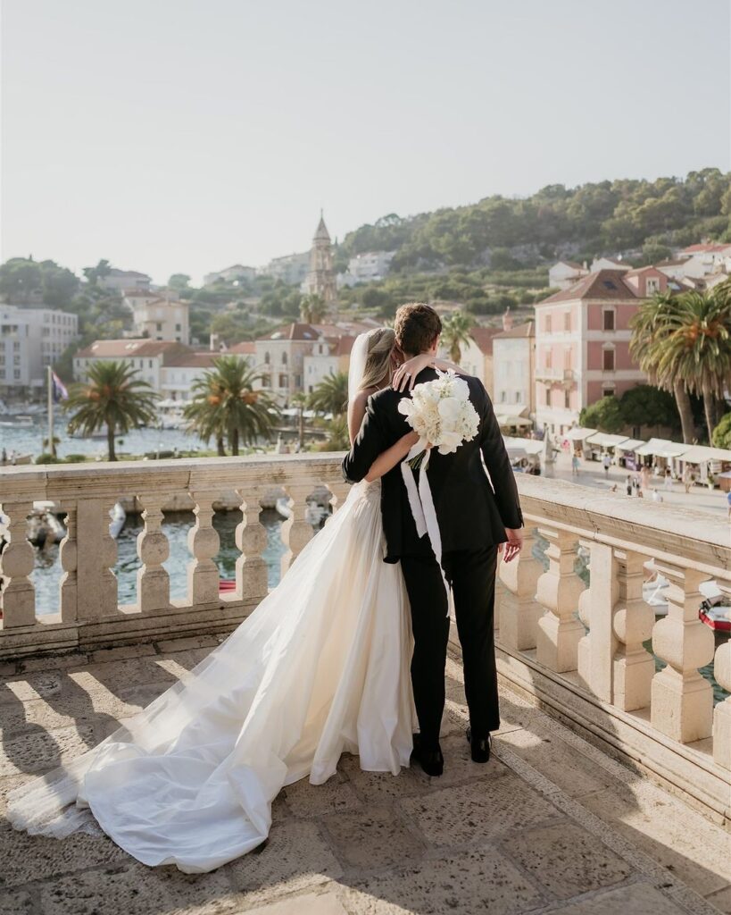 Couple holding each other in their dream wedding