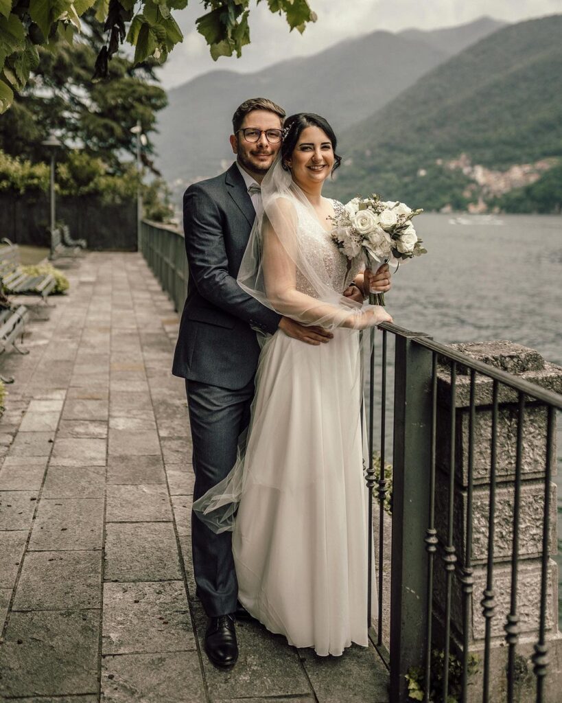 couple holding each other for a phtoshoot on their destination wedding